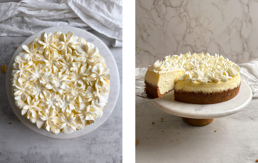 Aerial shot of a cheesecake displayed on a cake stand, featuring decorative whipped cream florets piped elegantly on the surface.