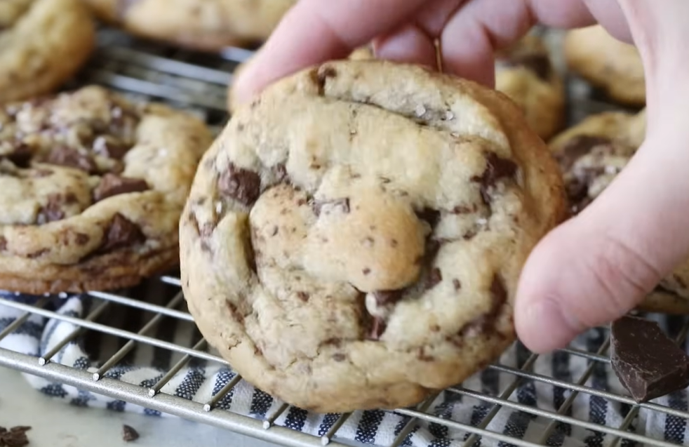 Here is the overhead picture of large, thick chocolate chip cookies on a wire rack: