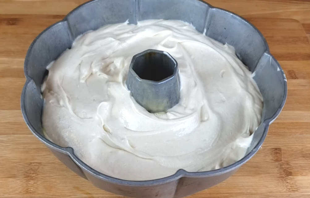 Simply pour the cake batter into the prepared Bundt pan